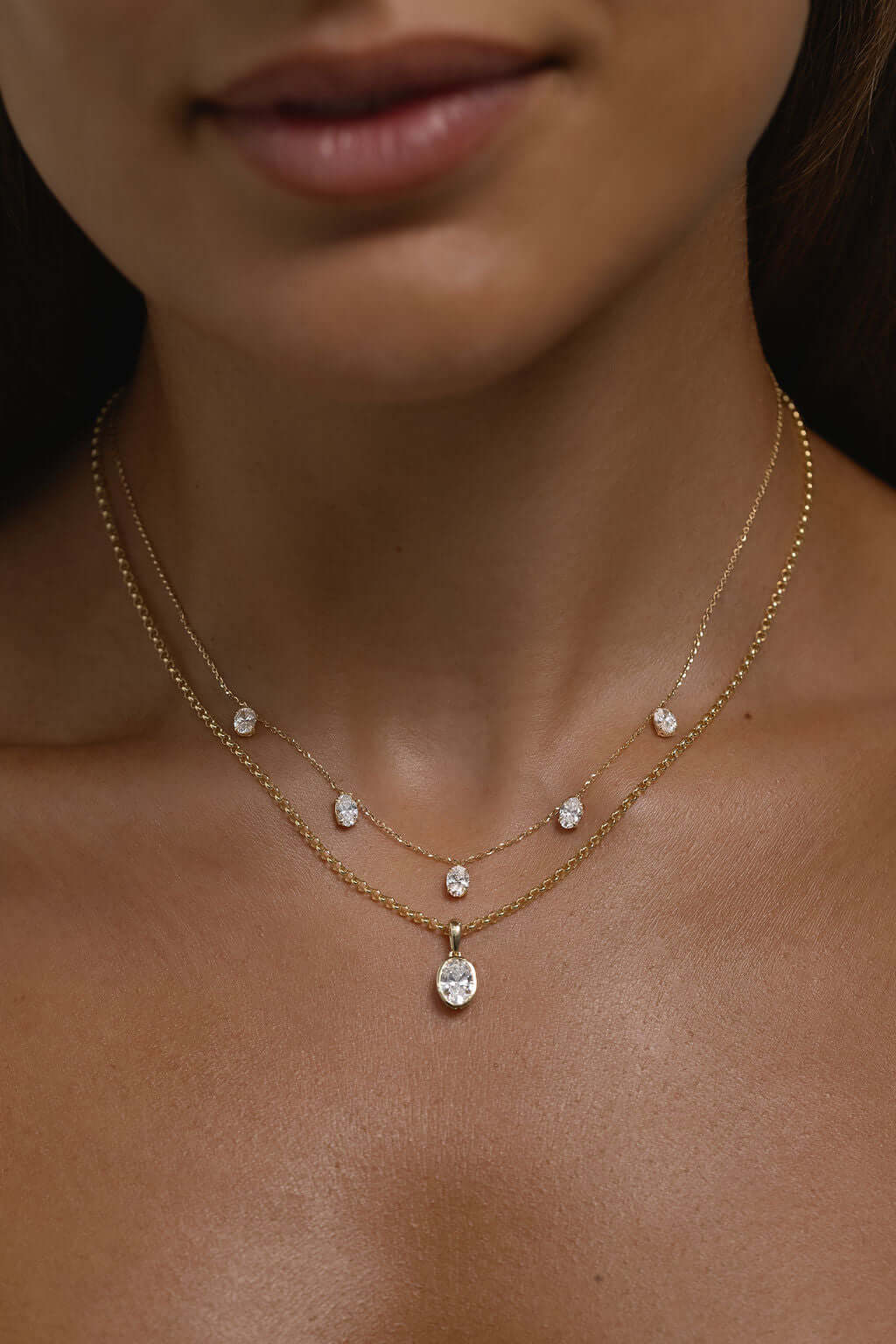 Hanging Oval Diamond Station Necklace 1.6ct Lab Diamond in 18ct yellow gold worn by a model.