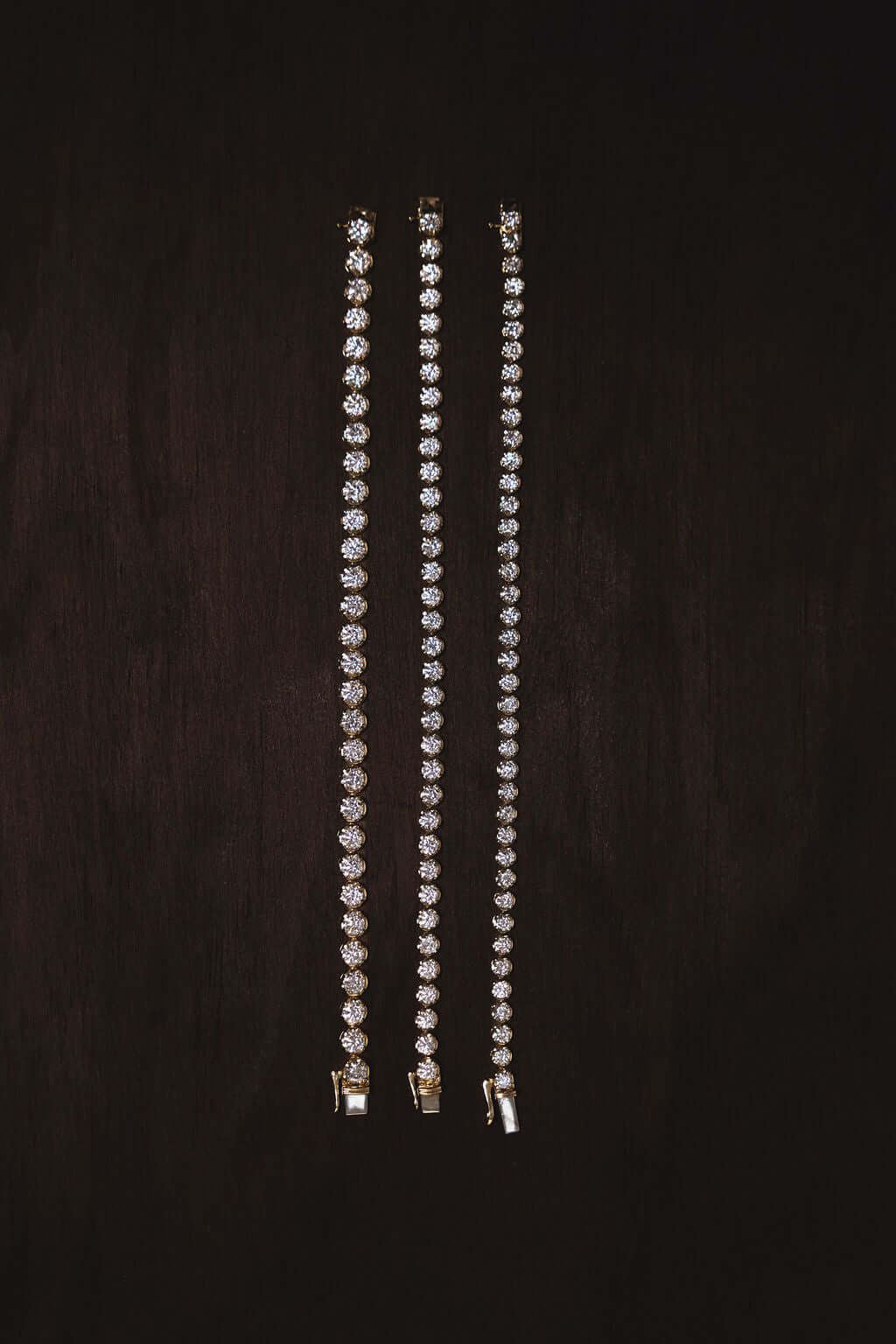 Elevated Round Tennis Bracelet 9.2ct Lab Diamond displayed on a dark background.