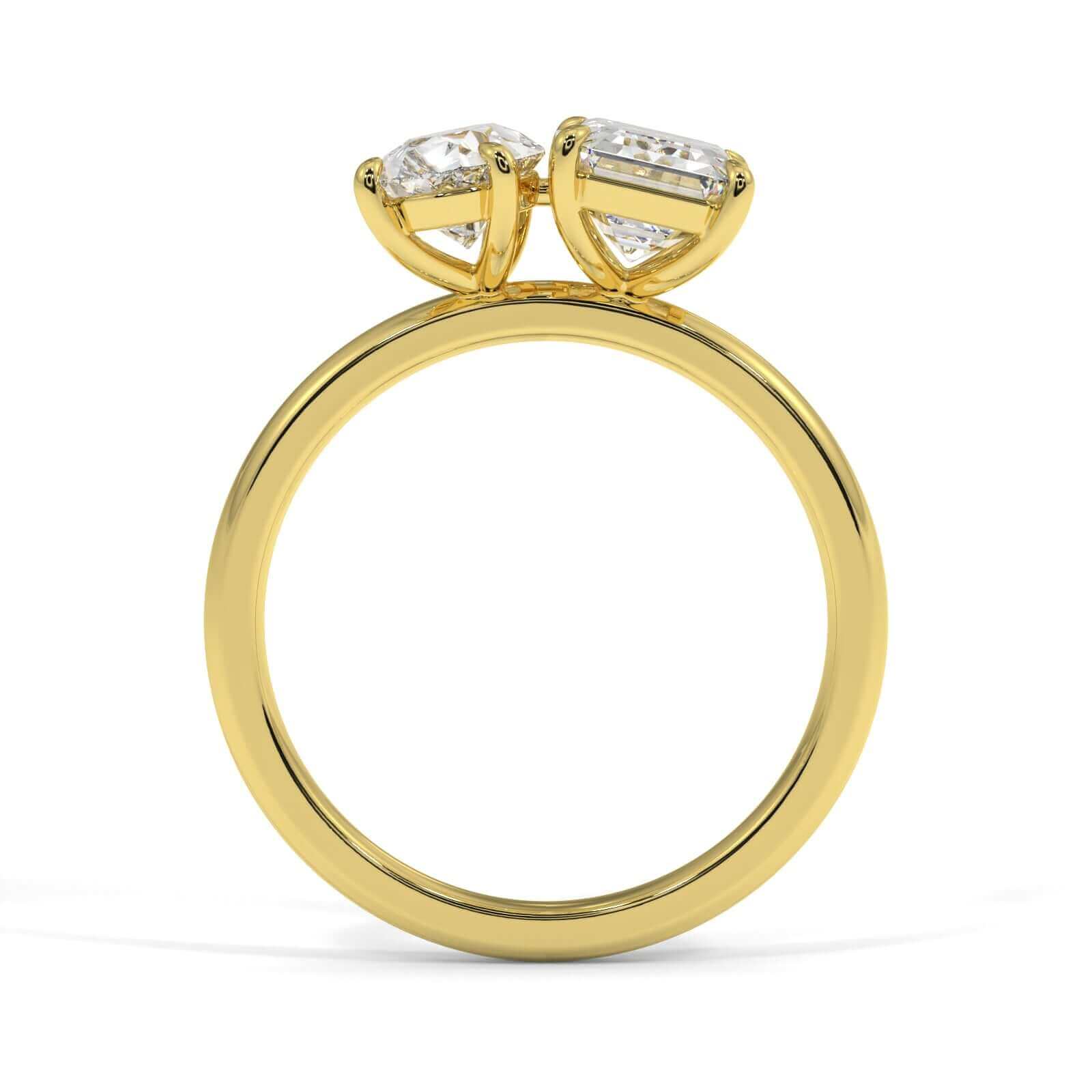 Emerald and Pear Cut Diamond Engagement Ring Gold