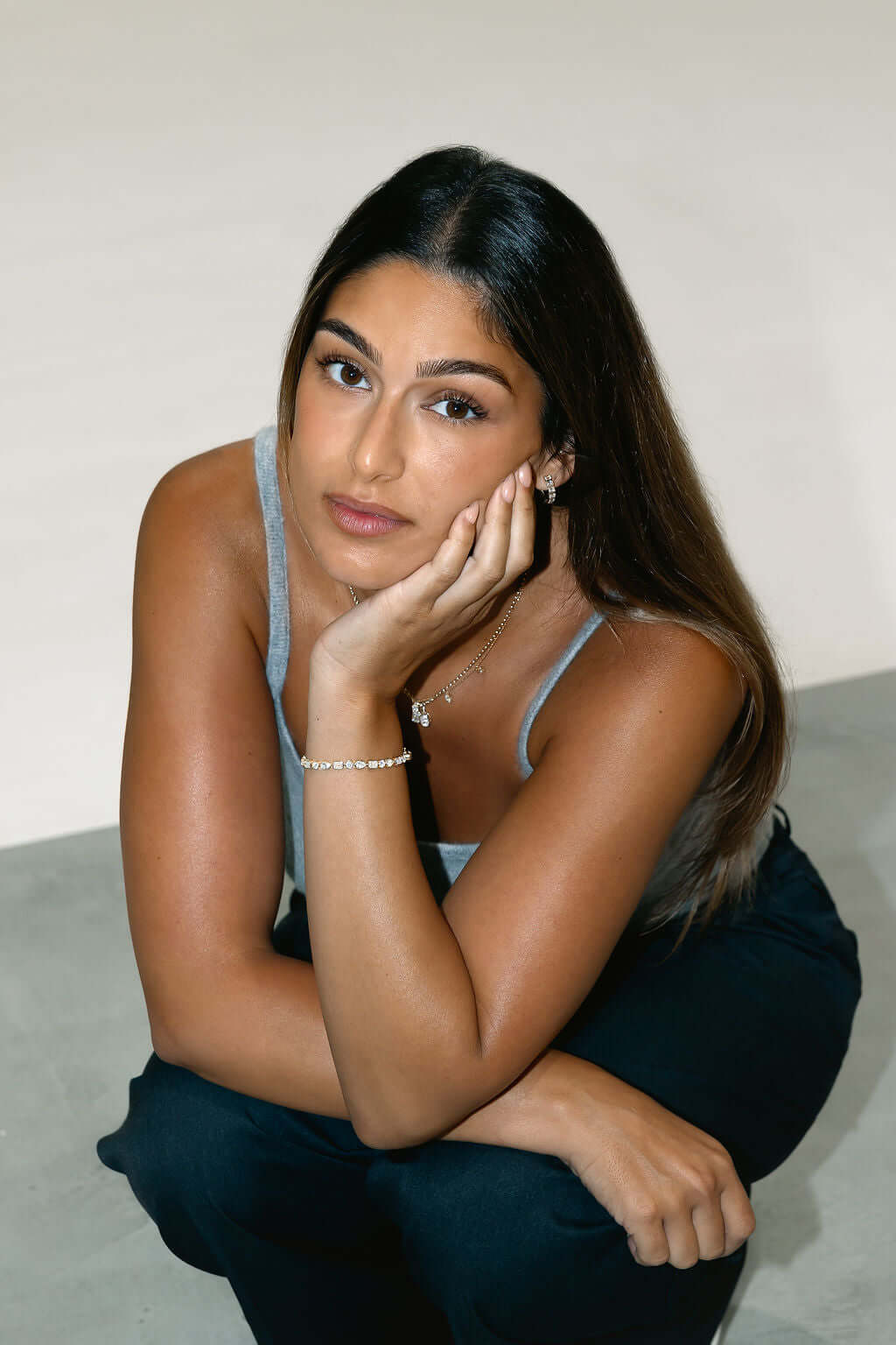 Elevated Round Tennis Bracelet 9.2ct Lab Diamond worn by a model, showcased elegantly on her wrist.
