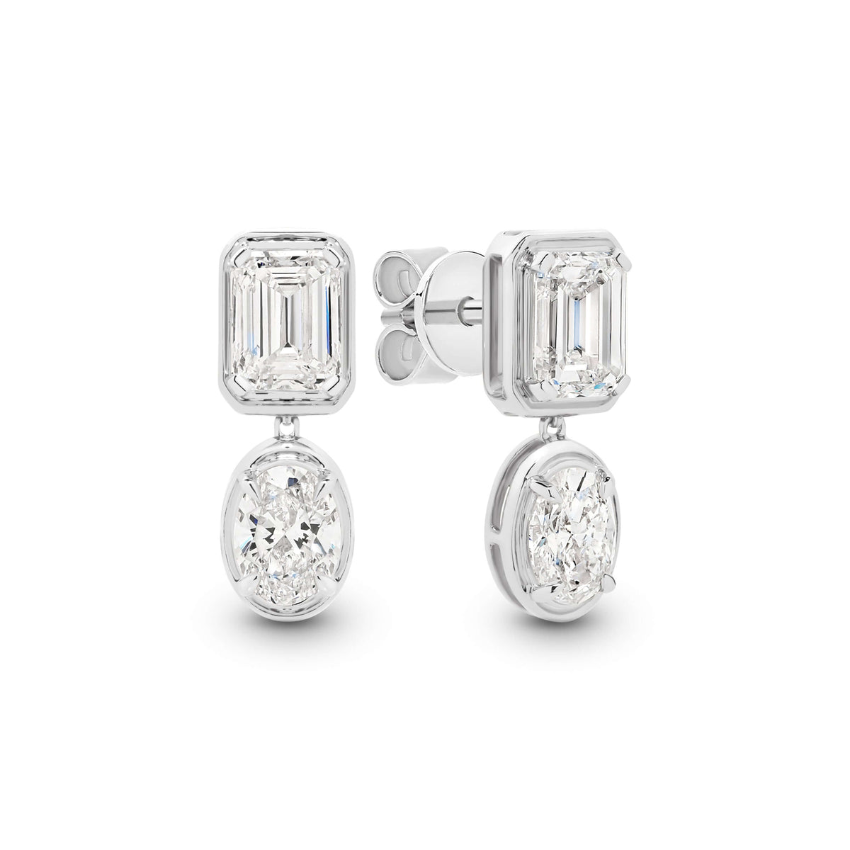 Emerald and Oval Bezel Stud Earrings Lab Diamond in 9ct white gold featuring F/VS lab diamonds totaling 2.4ct.