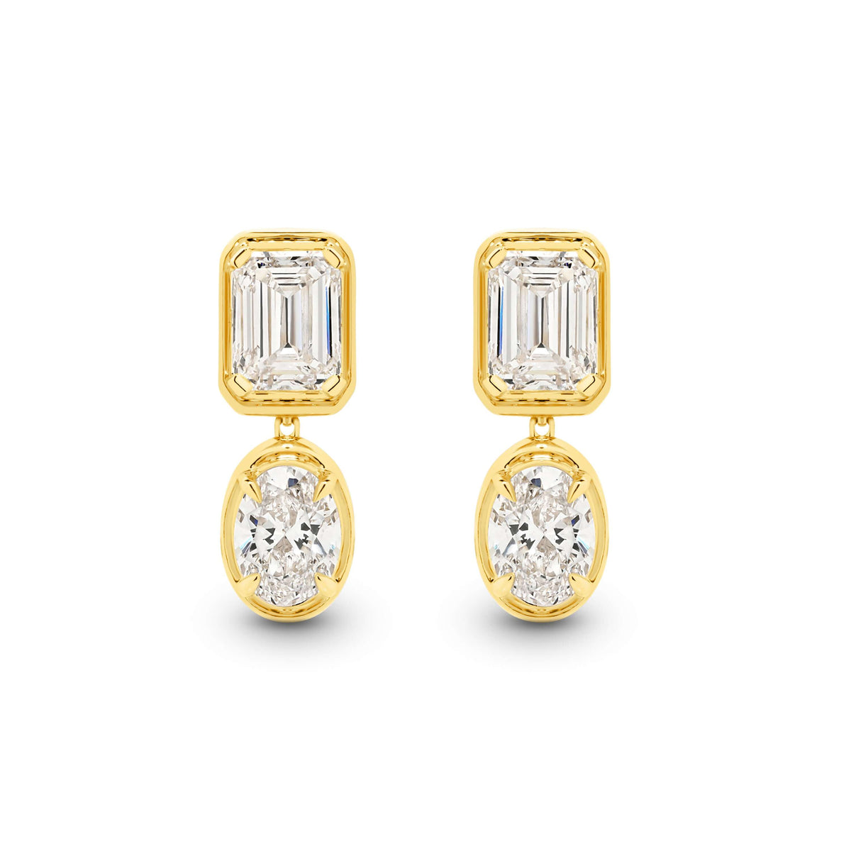 Emerald and Oval Bezel Stud Earrings Lab Diamond in 9ct yellow gold with F/VS lab diamonds.