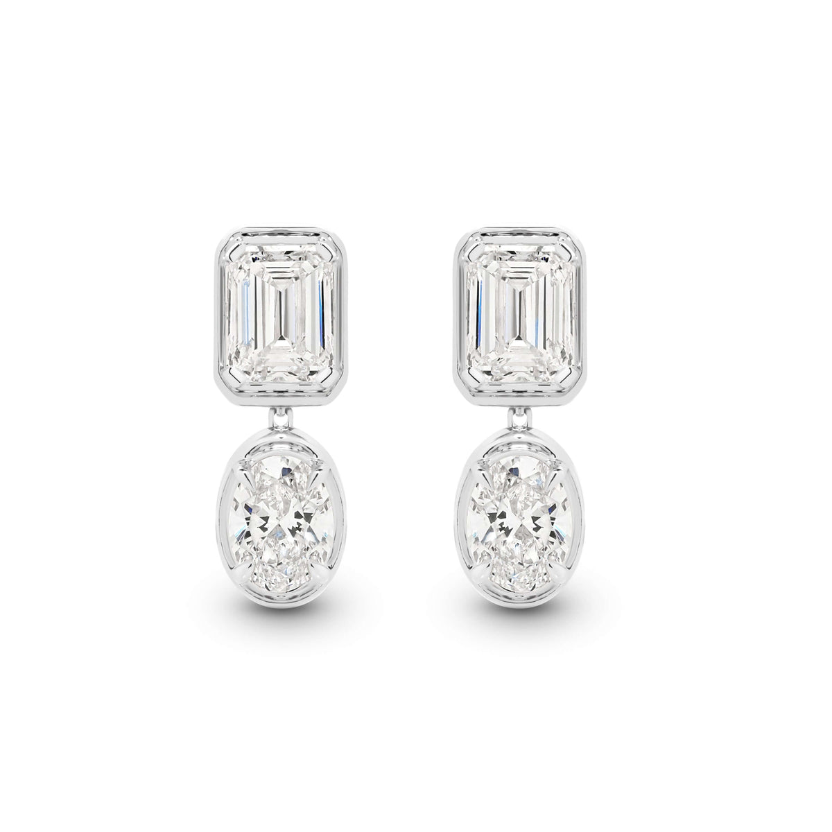 Emerald and Oval Bezel Stud Earrings Lab Diamond in 9ct white gold with F/VS lab diamonds totaling 2.4ct.