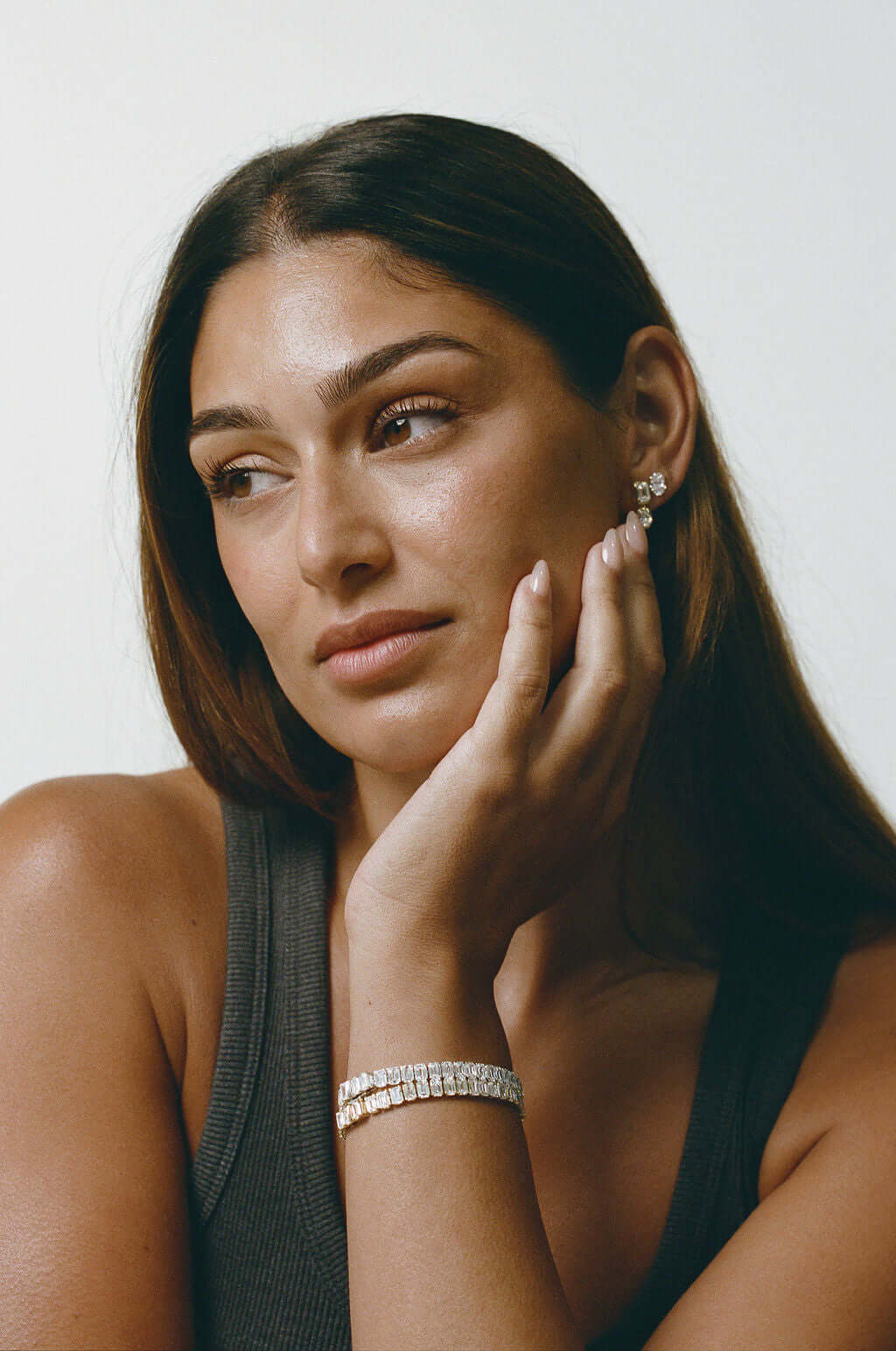 Emerald Tennis Bracelet 21ct Lab Diamond worn by a model showcasing elegance with lab diamonds in 9ct white gold.